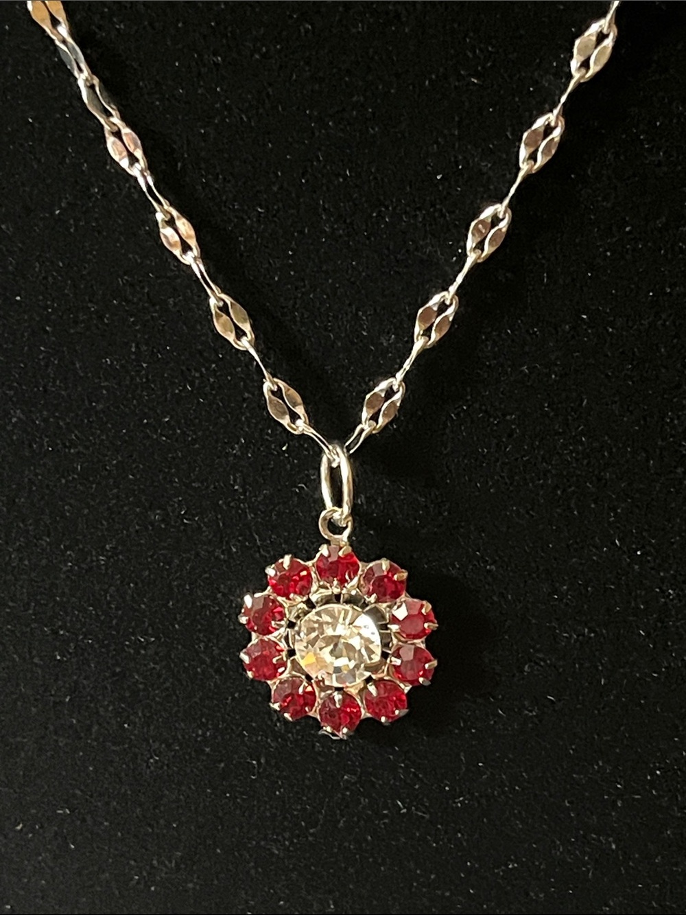 Petite (5/8”)Red Crystal Flower Pendant Necklace on 18” Silvertone Sparkle Chain